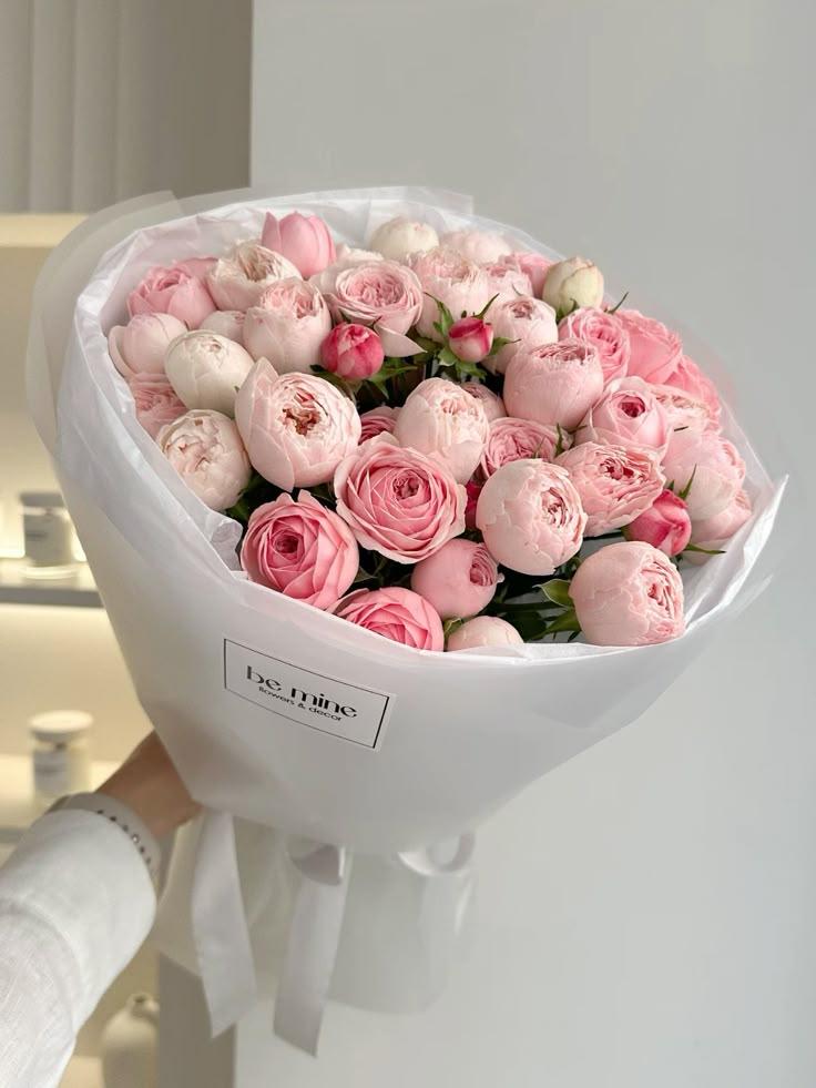 GardenQuietPlume workshop space where corporate flower arrangements are designed and prepared for business delivery